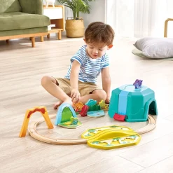 HAPE Set de Juego Tren de Dinosaurios con Cubo